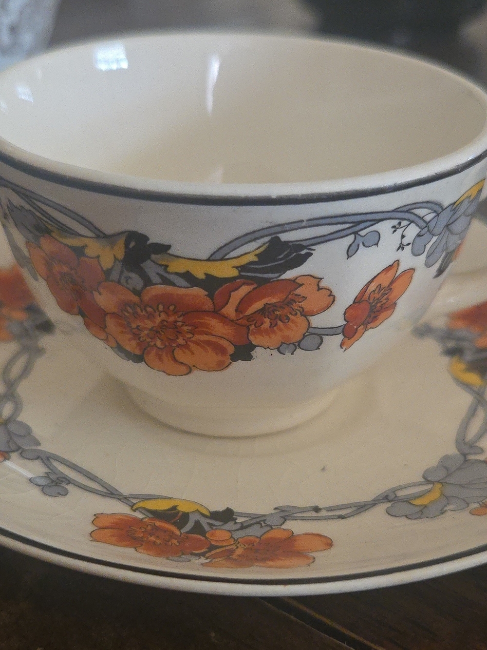 Homer Laughlin Cream Teacup and Saucer with Orange Floral Band